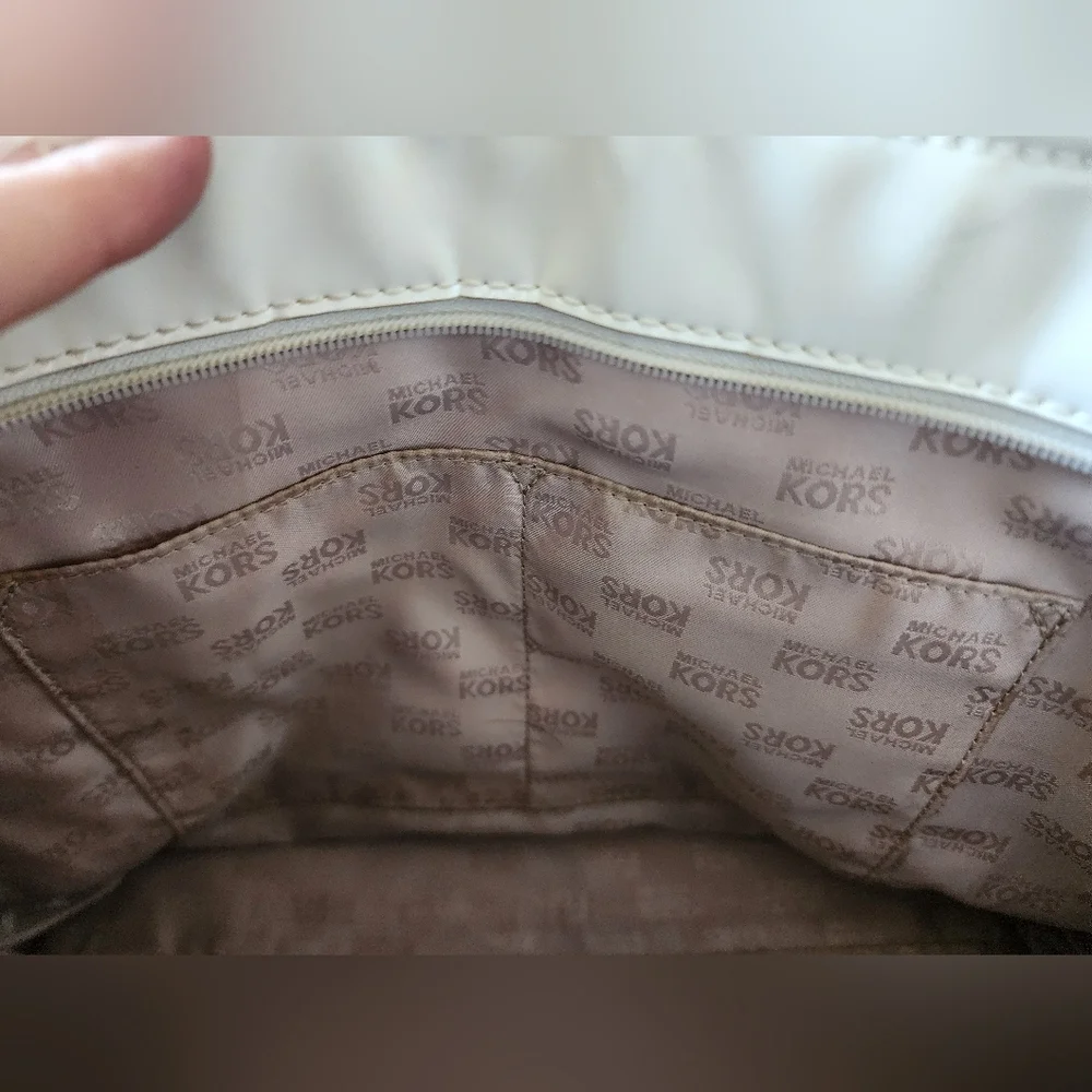 Preowned fair condition Michael Kors white monogrammed‎ tote bag